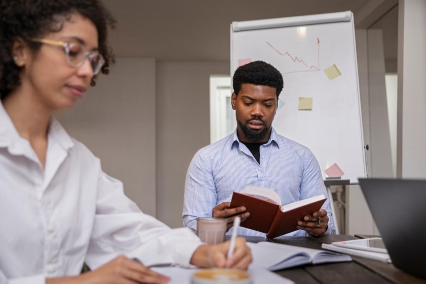 Professional consultation session discussing financial planning documentation